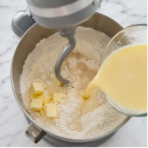 Step 1: Mixing the yeast dough with milk and butter