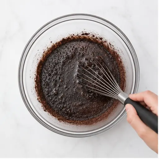 Step 1: Whisking cocoa and hot water