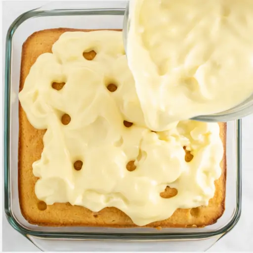 Step 2: Pour banana pudding over warm cake