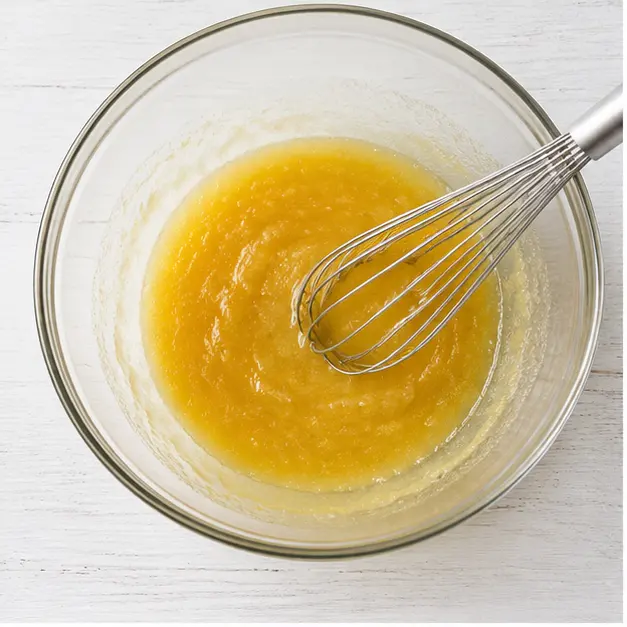 Step 1: Whisking melted butter and sugar