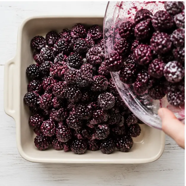 Step 3: Transferring berry mixture to baking dish