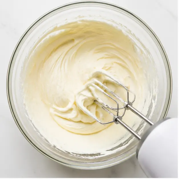 Step 1: Beating cream cheese and sugar for filling