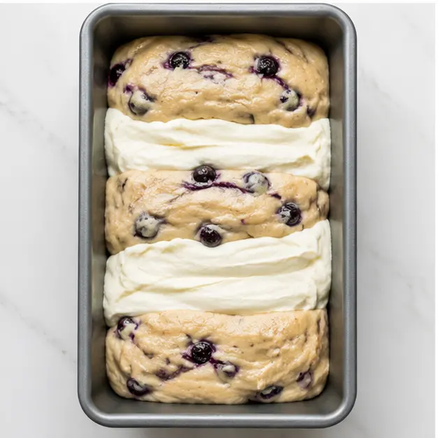Step 3: Layering batter and cream cheese in loaf pan