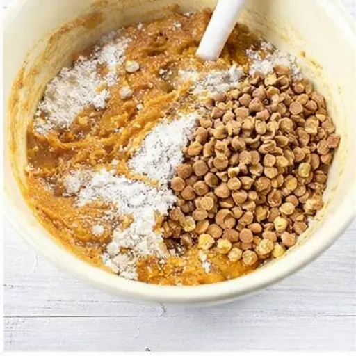 Step 2: Fold in dry ingredients with chips and walnuts