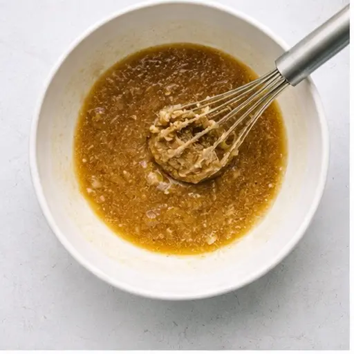 Step 1: Whisking melted butter and sugars together