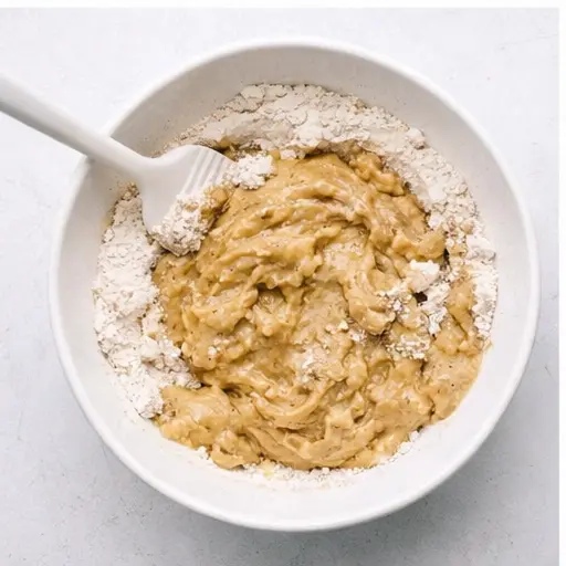 Step 3: Folding dry ingredients into wet batter