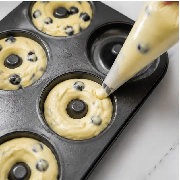 Step 3: Piping batter into donut pan