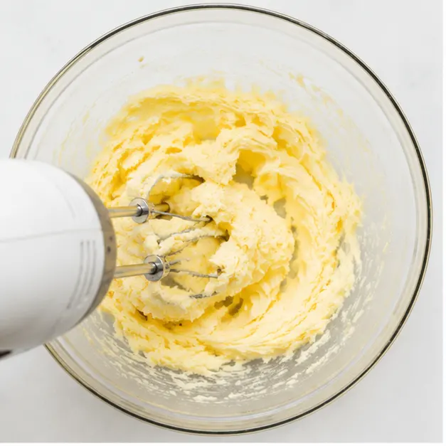 Step 1: Creaming butter and sugars until light and fluffy