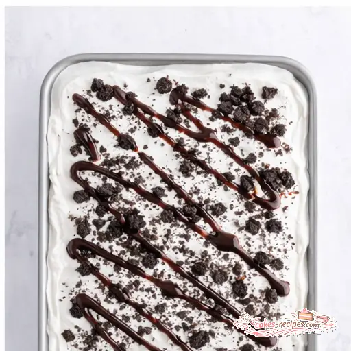 Step 4: Topping with whipped cream and Oreos