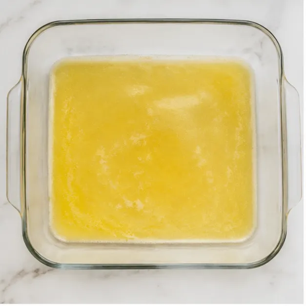 Step 1: Melt butter in baking dish