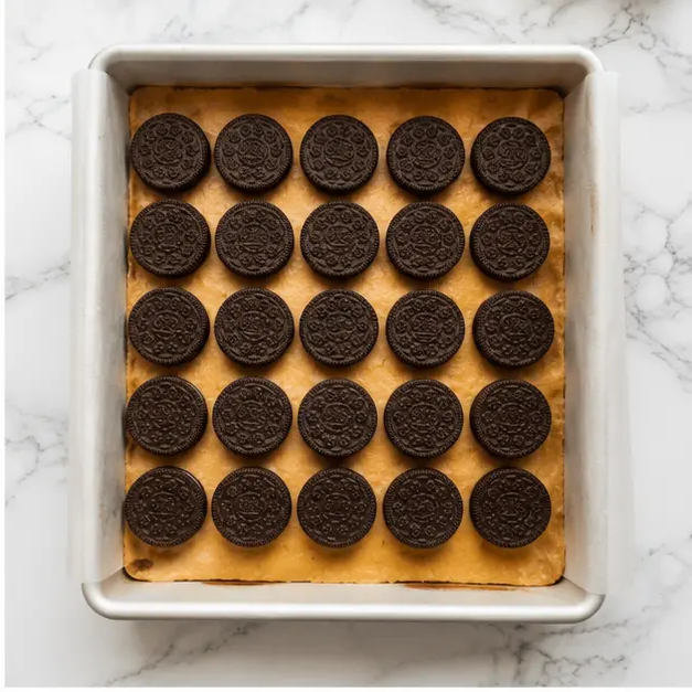 Step 2: Arrange Oreo cookies on dough