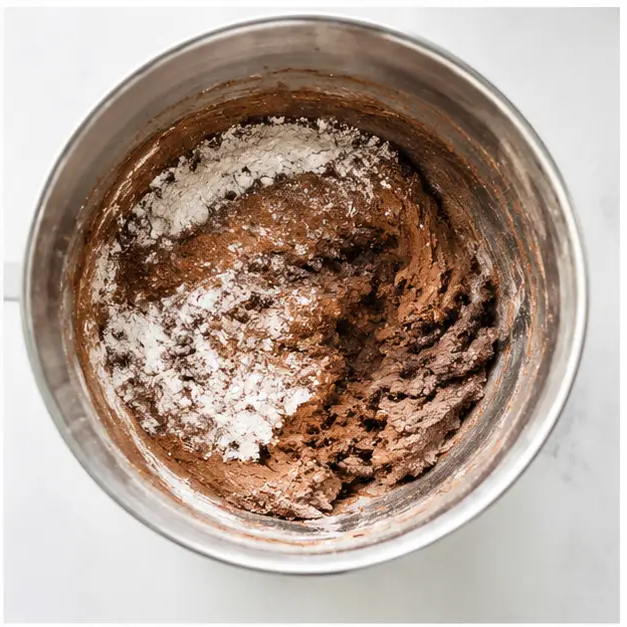 Step 2: Adding dry ingredients to form dough