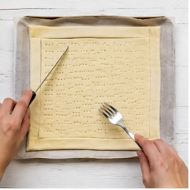 Step 1: Scoring and docking puff pastry