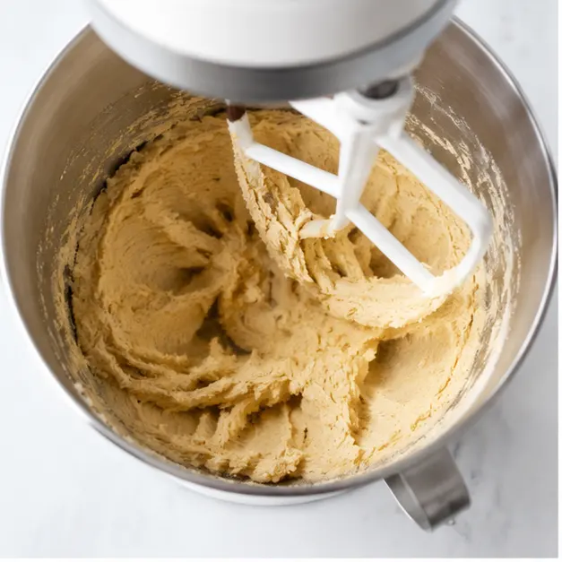 Step 1: Creaming butter and sugars until light and fluffy