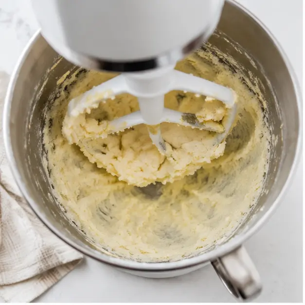 Step 1: Creaming softened butter with brown and granulated sugars