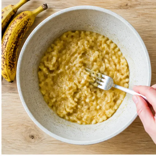 Mash ripe bananas with a fork