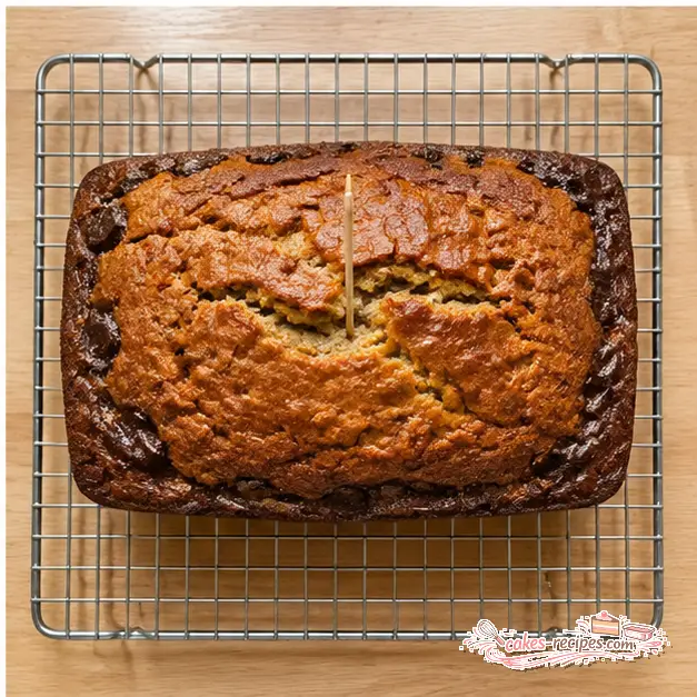 Baking the loaf and testing with a toothpick for moist crumbs