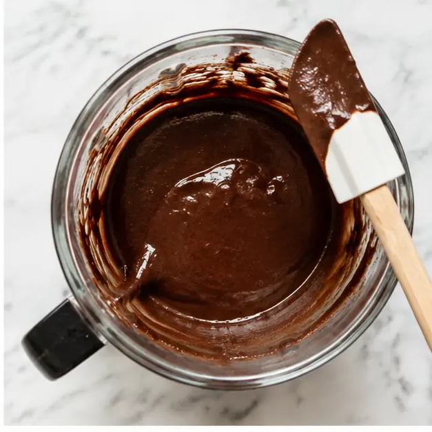 Add remaining wet ingredients and process until glossy