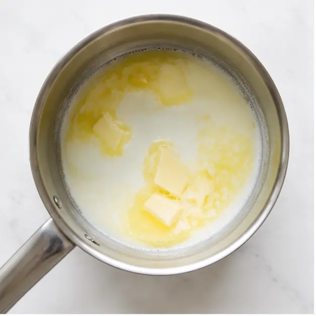 Step 1: Heat the milk and butter until the butter melts and the liquid is lukewarm