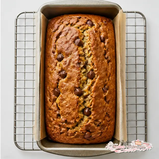 Bake the loaf in a parchment-lined 9x5 pan until golden with a crackly top
