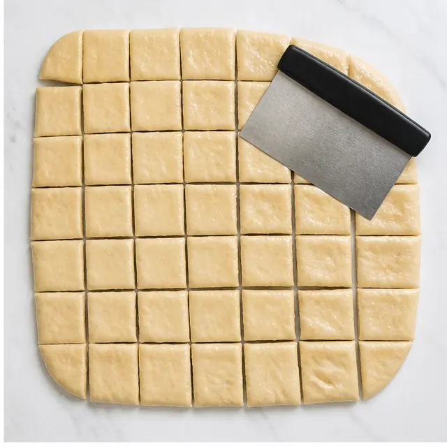 Step 2: Cut the rolled dough into small squares