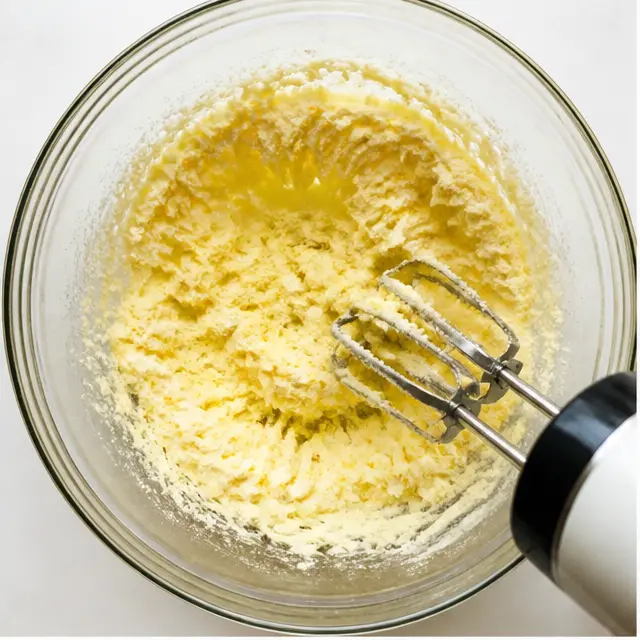 Step 1: Creaming butter, oil, and sugar until fluffy