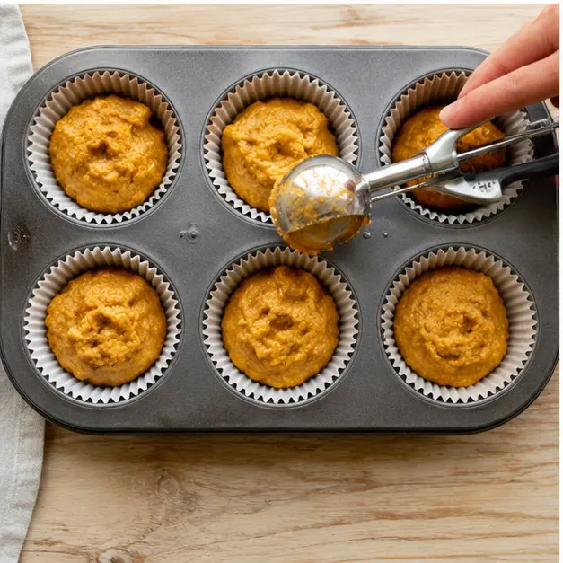 Step 3: Scoop batter into lined muffin tin