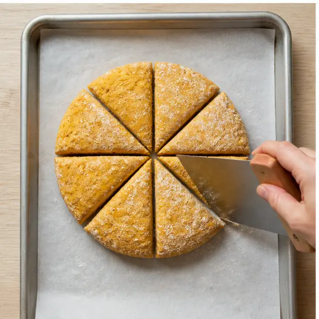 Pat the dough into a thick round and cut it into 8 wedges on parchment