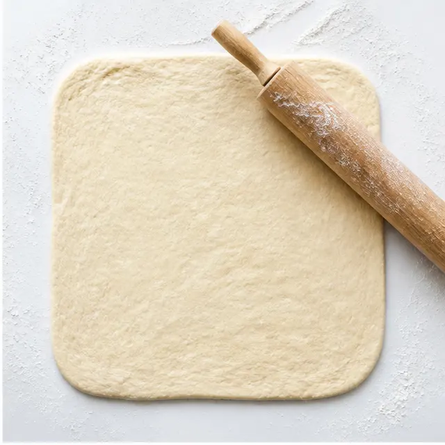 Step 2: Rolling the dough into a large thin rectangle